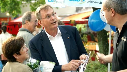 Gestatten, Singhammer: Im September machte er noch auf der Straße Wahlkampf, jetzt sitzt der Münchner CSU-Abgeordnete bei den Koalitionsverhandlungen mit am Tisch.