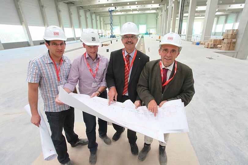 Bauherrn-Vertreter Christian Ecker, Ingenieur Wolfgang Roppelt, Projektleiter Gerhard Lutz und DB-Mann Hilmar Laug (von links).