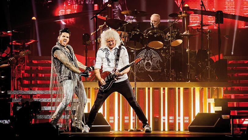 Adam Lambert (l.) mit Queen-Gitarrist Brian May (M.) und Schlagzeuger Roger Taylor.