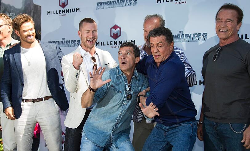 XY präsentieren sich bei den 67. Filmfestspielen in Cannes bei einem Fototermin für "The Expendables 3".