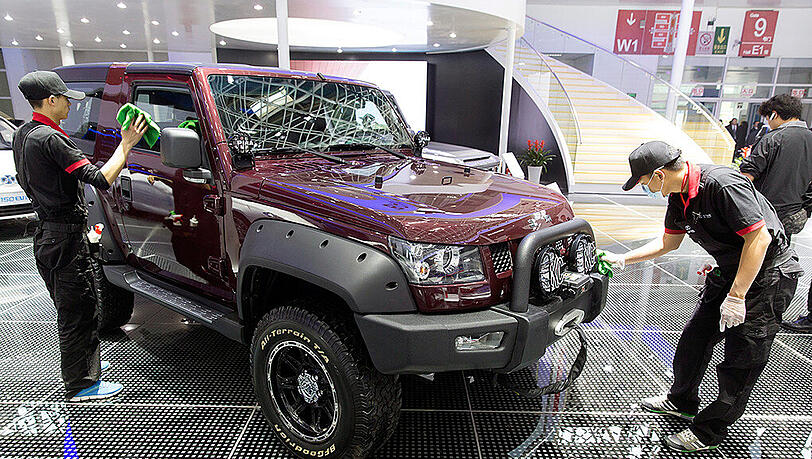 Ein SUV von Beijing Auto (BAIC) bei einer Autoshow: BAIC will sich bei Daimler einkaufen. Ein SUV von Beijing Auto (BAIC) bei einer Autoshow: BAIC will sich bei Daimler einkaufen.