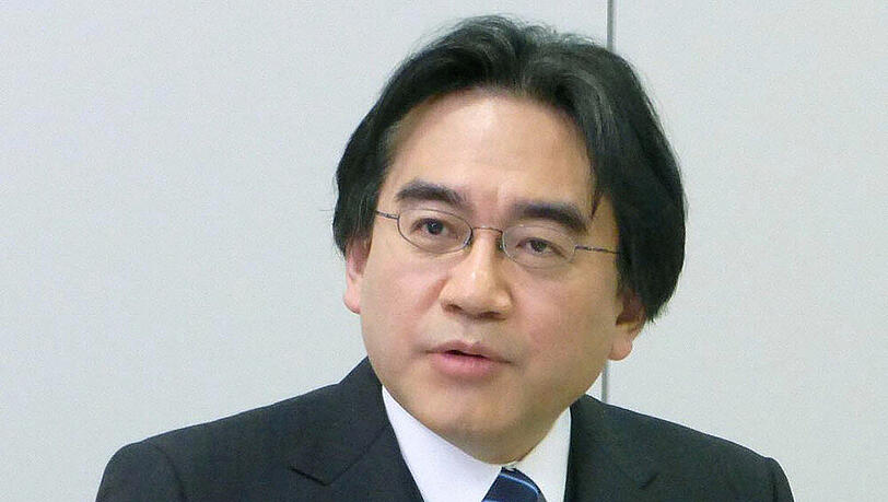 Satoru Iwata während einer Pressekonferenz im Januar 2013 Satoru Iwata während einer Pressekonferenz im Januar 2013