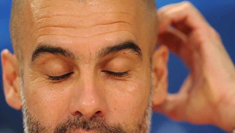 Pep Guardiola grübelt über der Strategie für das Spiel des FC Bayern gegen Real Madrid.