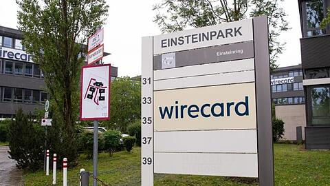 Der Schriftzug von Wirecard ist an der Firmenzentrale des Zahlungsdienstleisters zu sehen. Foto: Sven Hoppe/dpa/Archivbild