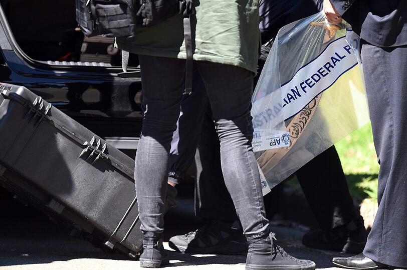 Größter Anti-Terror-Einsatz in der australischen Geschichte: Ein 22-Jähriger hatte Massen-Enthauptungen von Passanten geplant. Die Bilder vom Einsatz der Polizei.