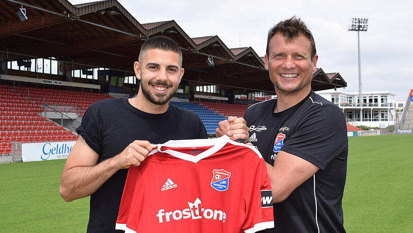 Einst beim TSV 1860, jetzt bei Haching: Moritz Heinrich (li.), hier mit SpVgg-Trainer Claus Schromm.