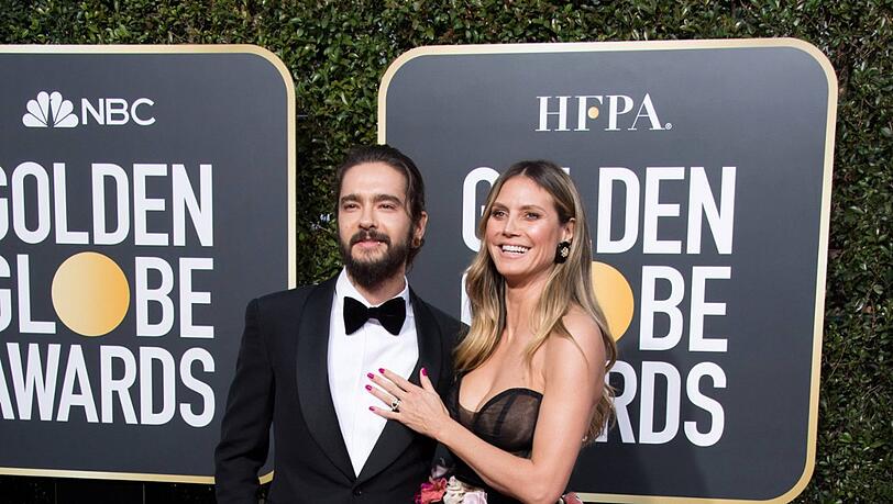 Top: Frisch verlobt strahlt Heidi Klum mit Tom Kaulitz auf dem Roten Teppich. Perfekt dazu passend ist da die Blumen-verzierte Robe von Monique Lhuillier. Top: Frisch verlobt strahlt Heidi Klum mit Tom Kaulitz auf dem Roten Teppich. Perfekt dazu passend ist da die Blumen-verzierte Robe von Monique Lhuillier.