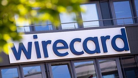 Der Schriftzug von Wirecard an der Firmenzentrale des Zahlungsdienstleisters. Foto: Sven Hoppe/dpa