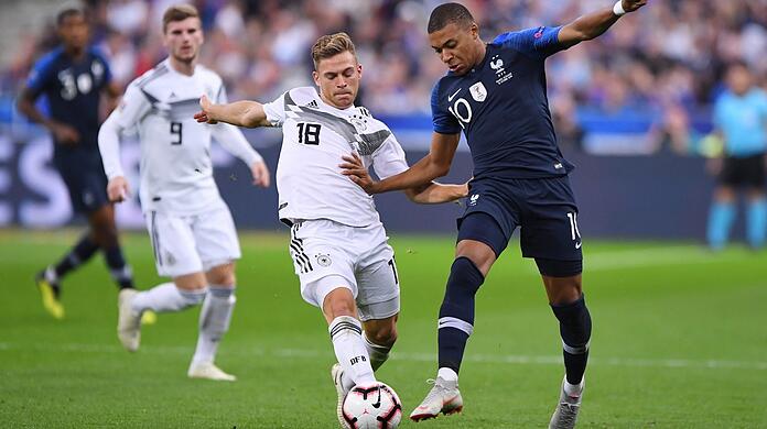 Zwei Spieler, die zu den Superstars dieser EM werden könnten: Frankreichs Kylian Mbappé (rechts) und Deutschlands Joshua Kimmich - hier beim Nations-League-Duell 2018.