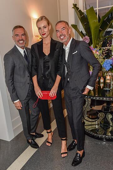 Die Kreativdirektoren und Designer Dean und Dan Caten mit Influencerin Marlies Pia.