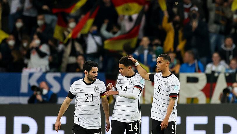 Goretzka-Konkurrenten im DFB-Mittelfeld: Ilkay Gündogan (l.) und Bayern-Star Jamal Musiala. Thilo Kehrer (r.) kämpft um einen Abwehrplatz. Goretzka-Konkurrenten im DFB-Mittelfeld: Ilkay Gündogan (l.) und Bayern-Star Jamal Musiala. Thilo Kehrer (r.) kämpft um einen Abwehrplatz.