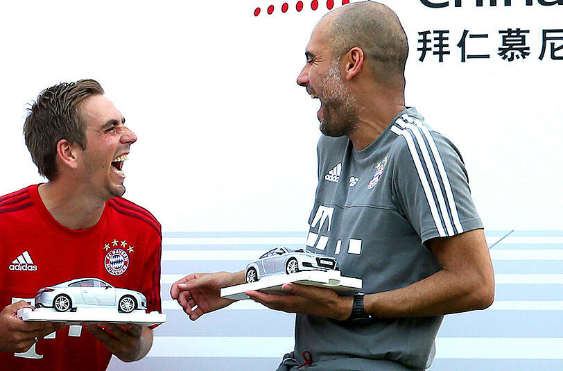 Gute Stimmung beim Audi Quattro Cup - Philipp Lahm und Pep Guardiola.