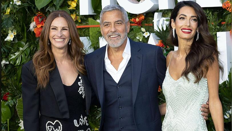Traum-Trio: George Clooney zwischen Filmehefrau Julia Roberts (l.) und seiner Ehefrau im echten Leben Amal Clooney.