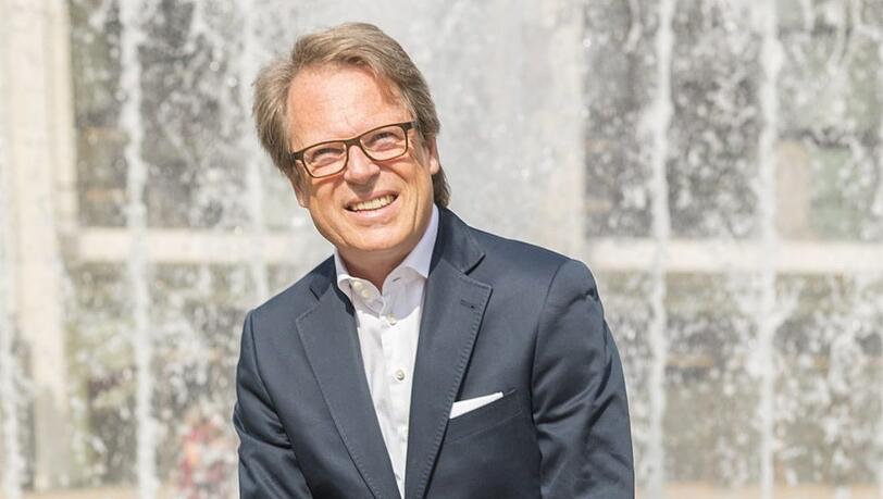 Der gebürtige Münchner Andreas Schessl stammt aus einer Musikerfamilie. Er studiert Horn und Betriebswirtschaft, organisierte 1984 eine erste Konzertreihe in Blutenburg und arbeitete bis 1996 als Plattenmanager. Unter seiner Leitung expandierte Münchenmusik auch nach Stuttgart, Nürnberg, Berlin und ins deutschsprachige Ausland.