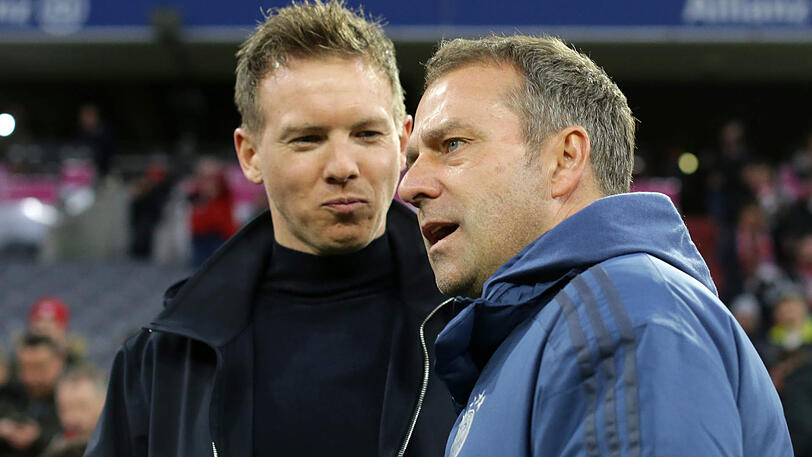 Angriff von Verfolger Leipzig abgewehrt: Hansi Flick (r.) mit RB-Coach Julian Nagelsmann.