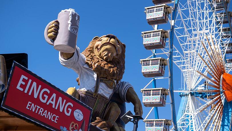 Ein Löwe, Bier und Riesenrad: Ist denn schon wieder Wiesn? Das Frühlingsfest ist Münchens erstes Volksfest seit der Pandemie.