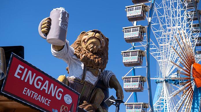 Ein Löwe, Bier und Riesenrad: Ist denn schon wieder Wiesn? Das Frühlingsfest ist Münchens erstes Volksfest seit der Pandemie.