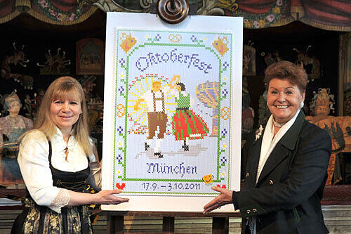 So präsentiert die Stadt München die Wiesn 2011 auf dem aktuellen Werbeplakat