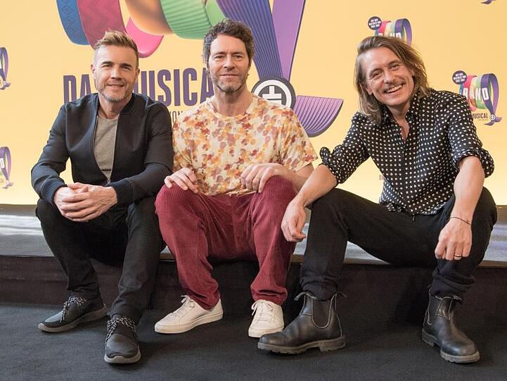 Entspannt im Hier und Jetzt: Gary Barlow (l-r), Howard Donald und Mark Owen.