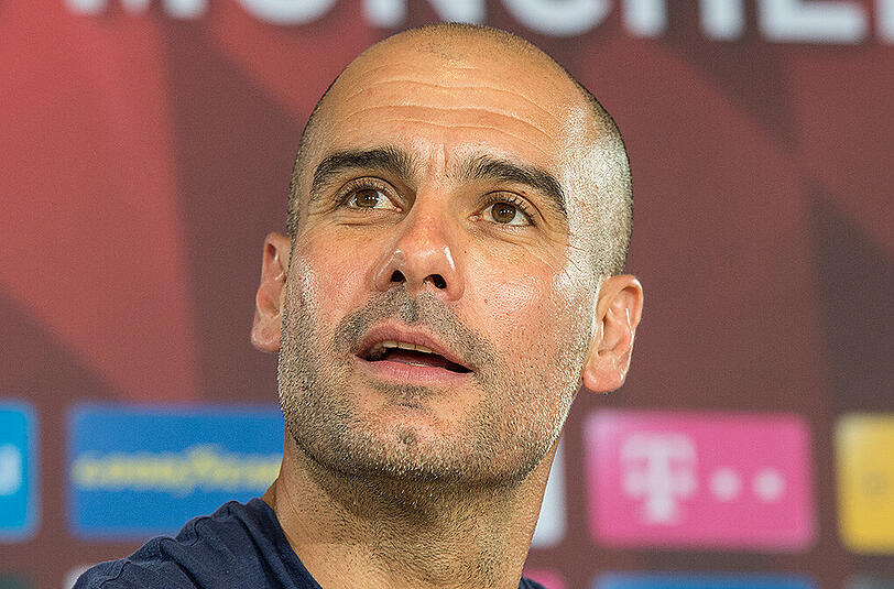 Der scheidende Bayern-Trainer Pep Guardiola während der PK am Dienstag.