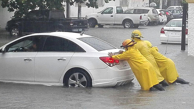 In Mexiko hat der Hurrikan "Irma" bereits zu teils schweren Überschwemmungen geführt. In Mexiko hat der Hurrikan "Irma" bereits zu teils schweren Überschwemmungen geführt.