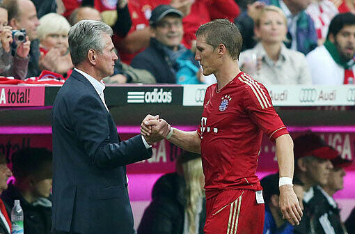 Bayern-Trainer Jupp Heynckes mit Bastian Schweinsteiger.