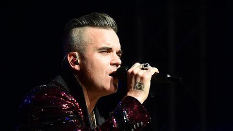 Robbie Williams will im nächsten Jahr ein Benefizkonzert geben.