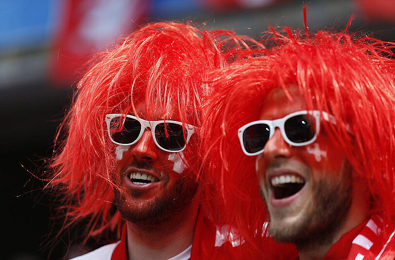 Swiss Men in Red.