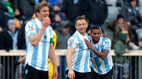 Erzwangen den Sieg des TSV 1860 gegen den KSC: Torschütze Kai Bülow (l.) und Vorbereiter Amilton (r.)