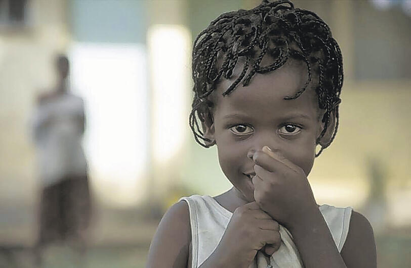 Das Filmplakat von &bdquo;Memory Books&ldquo; zeigt ein kleines Mädchen. In seiner Heimat Uganda hat Aids rund 1,3 Millionen Kinder zu Waisen gemacht.