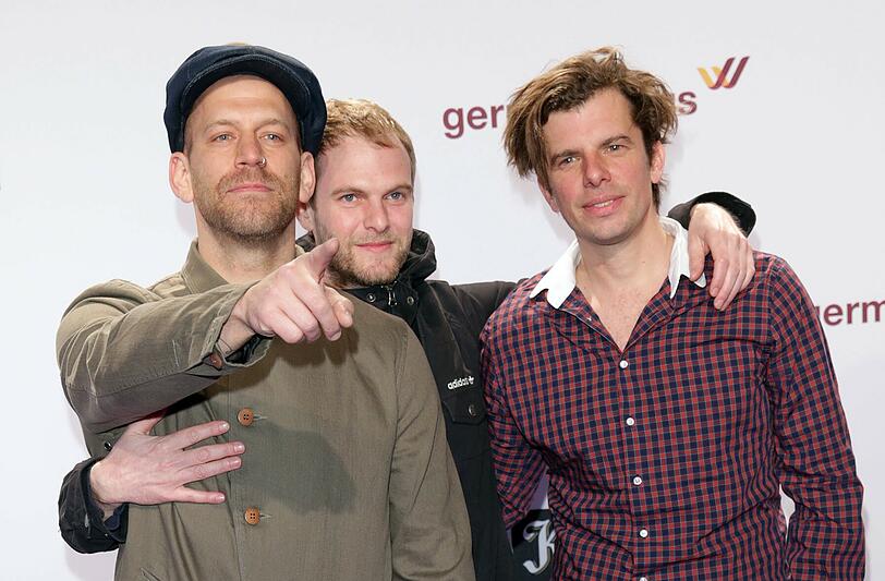 Peter Brugger (M), Florian Weber (l) und Rüdiger Linhof von der Band Sportfreunde Stiller