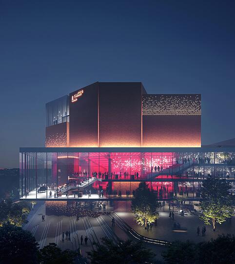Die Philharmonie mit dem neuen gläsernen Foyer, das alle Teile des Gebäudes miteinander verbindet &ndash; gesehen vom Motorama auf der gegenüberliegenden Seite der Rosenheimer Straße.