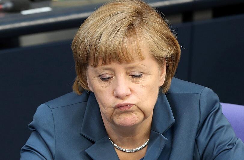 Glücklich wirkte Merkel nicht während der Debatte um die Frauenquote.