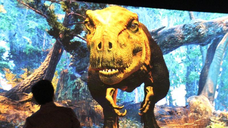 Ein interaktives Videospiel in der Ausstellung "T. rex: The Ultimate Predator". Ein interaktives Videospiel in der Ausstellung "T. rex: The Ultimate Predator".
