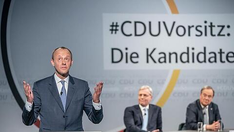 Friedrich Merz (l) versichert im Fall seiner Wahl zum CDU-Chef, einen Bruch mit der Ära Merkel verhindern zu wollen.