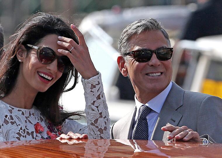 Amal und George Clooney