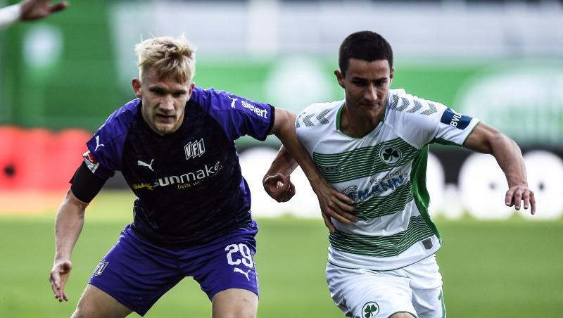 Bryan Henning von Osnabrück und Marco Meyerhoefer von Fürth (l-r.) kämpfen um den Ball. Foto: Lukas Barth-Tuttas/epa-POOL/dpa Bryan Henning von Osnabrück und Marco Meyerhoefer von Fürth (l-r.) kämpfen um den Ball. Foto: Lukas Barth-Tuttas/epa-POOL/dpa