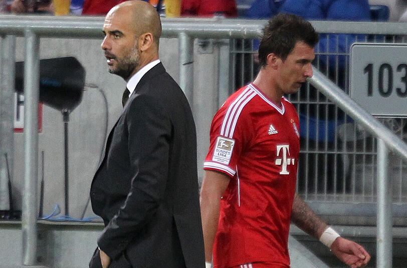 Gehen wohl künftig getrennte Wege: Trainer Pep Guardiola und Mittelstürmer Mario Mandzukic.