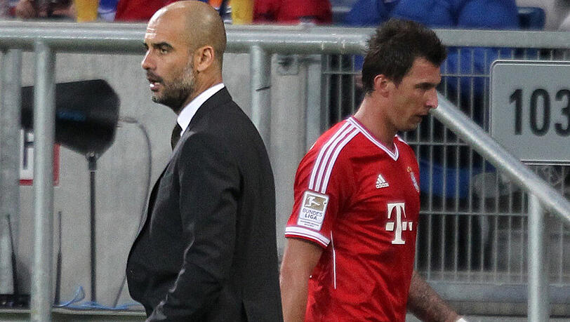 Gehen wohl künftig getrennte Wege: Trainer Pep Guardiola und Mittelstürmer Mario Mandzukic. Gehen wohl künftig getrennte Wege: Trainer Pep Guardiola und Mittelstürmer Mario Mandzukic.