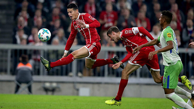 James Rodríguez (l.) blühte unter Jupp Heynckes auf. Thomas Müller (m.) will in der Rückrunde wieder richtig angreifen.