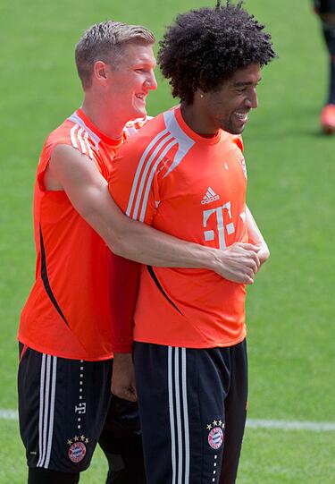 Schweinsteiger und Dante kuschelten ein bißchen