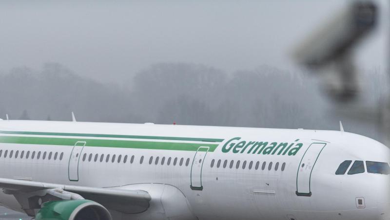 Eine Germania-Maschine an einem Flughafen. Foto: Guido Kirchner Eine Germania-Maschine an einem Flughafen. Foto: Guido Kirchner