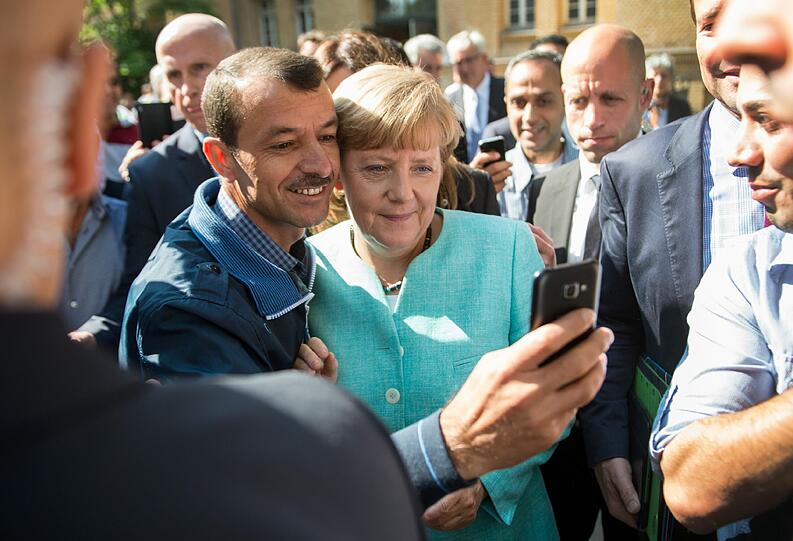 Das berühmte Selfie mit Flüchtlingen in Berlin.