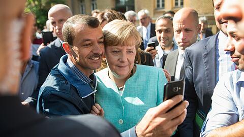 Das berühmte Selfie mit Flüchtlingen in Berlin.
