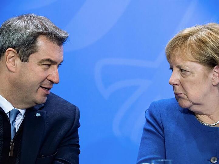 Kanzlerin Angela Merkel (CDU) und CSU-Chef Markus Söder haben Grund zur Freude.