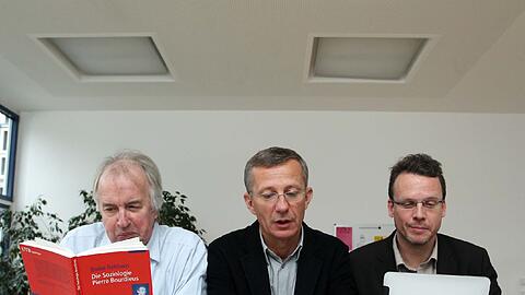 AZ-Redakteure Michael Heinrich, Matthias Maus und Georg Thanscheidt im Lesetest.