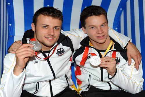 Getrennt trainieren, gemeinsam triumphieren: Patrick Hausding (vorn) und Sascha Klein mit ihrer Silber-Medaille.