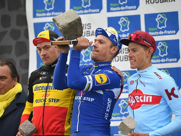 Das Podium: Ives Lampaert (l), Philippe Gilbert (M) und Nils Politt.