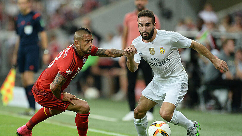 Audi Cup-Finale am 5. August in München: Arturo Vidal (links, FC Bayern) und Dani Carvajal von Real Madrid kämpfen um den Ball. Audi Cup-Finale am 5. August in München: Arturo Vidal (links, FC Bayern) und Dani Carvajal von Real Madrid kämpfen um den Ball.