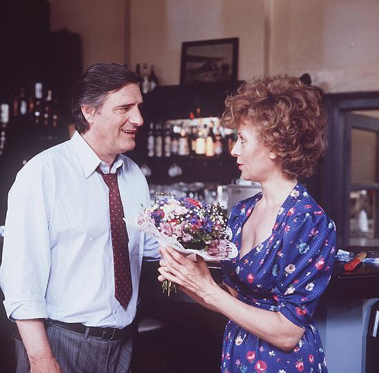 Zwischen 1986 und 1992 stehen Helmut Fischer und Ilse Neubauer in "Die Hausmeisterin" gemeinsam vor der Kamera.